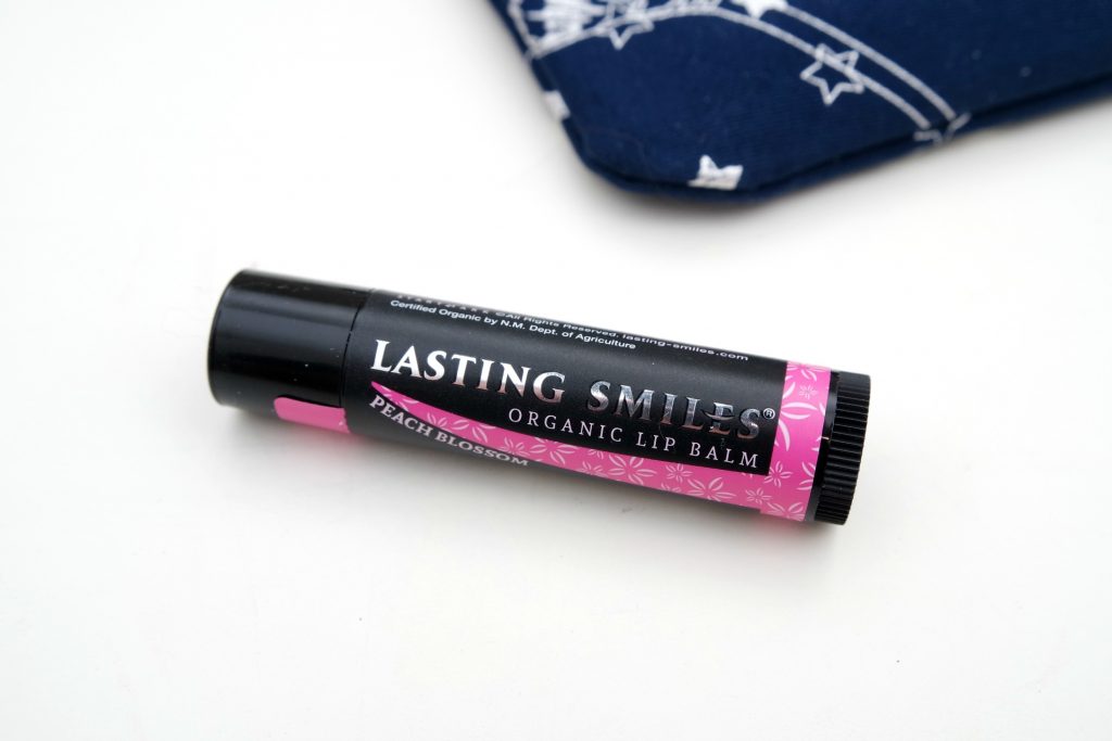 ipsy-glam-bag-november-2016-lasting-smiles-lipbalm-in-peach-blossom-01