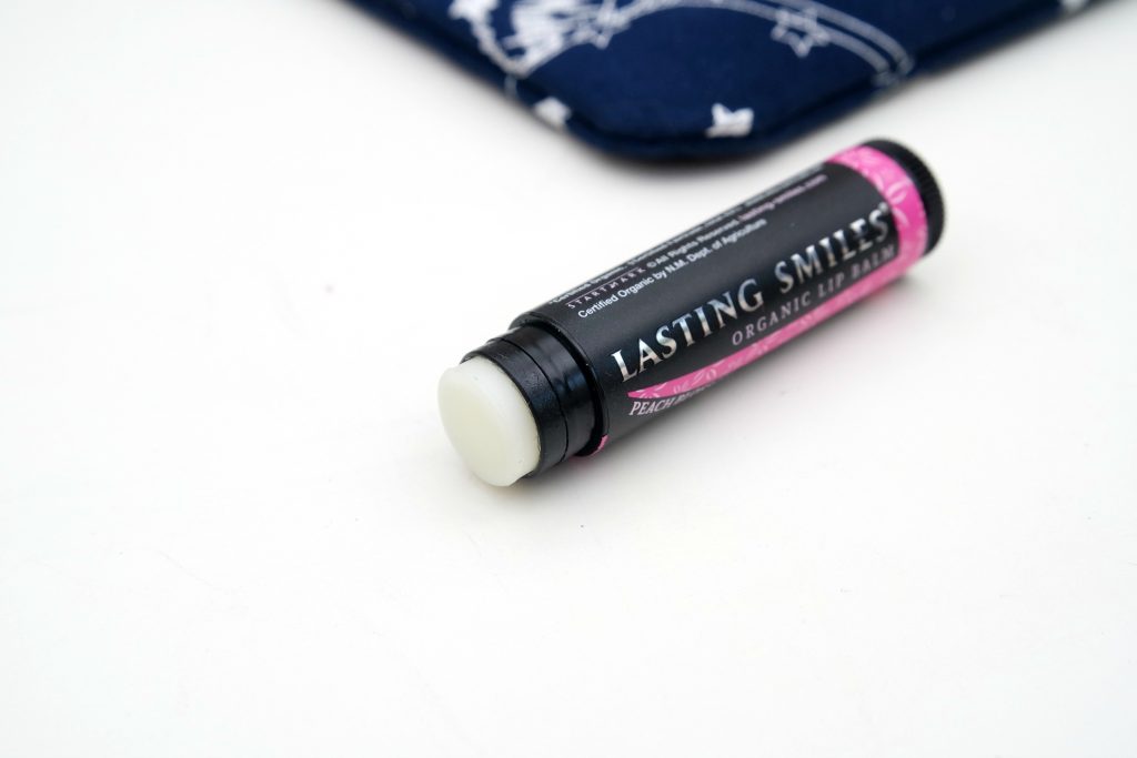 ipsy-glam-bag-november-2016-lasting-smiles-lipbalm-in-peach-blossom-02
