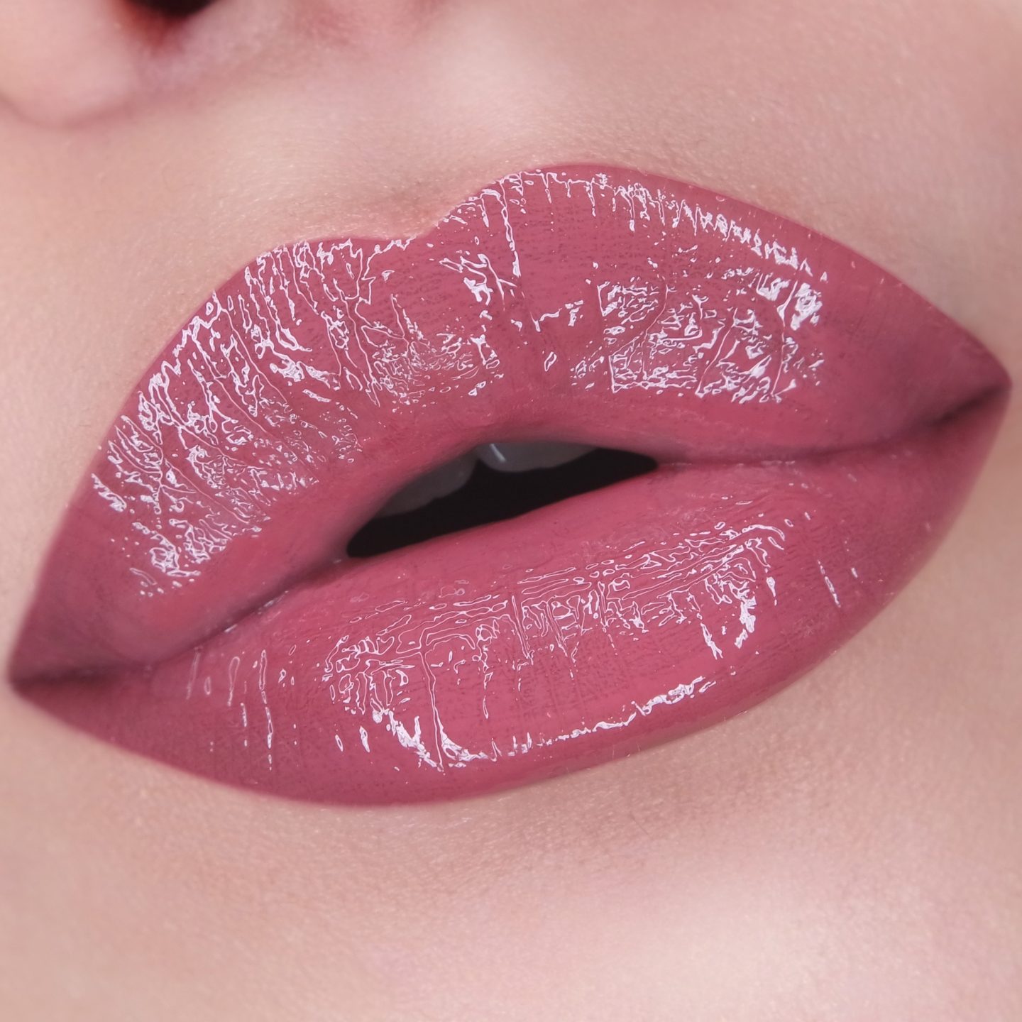 NARS Lip Gloss in Mythic Red Swatch